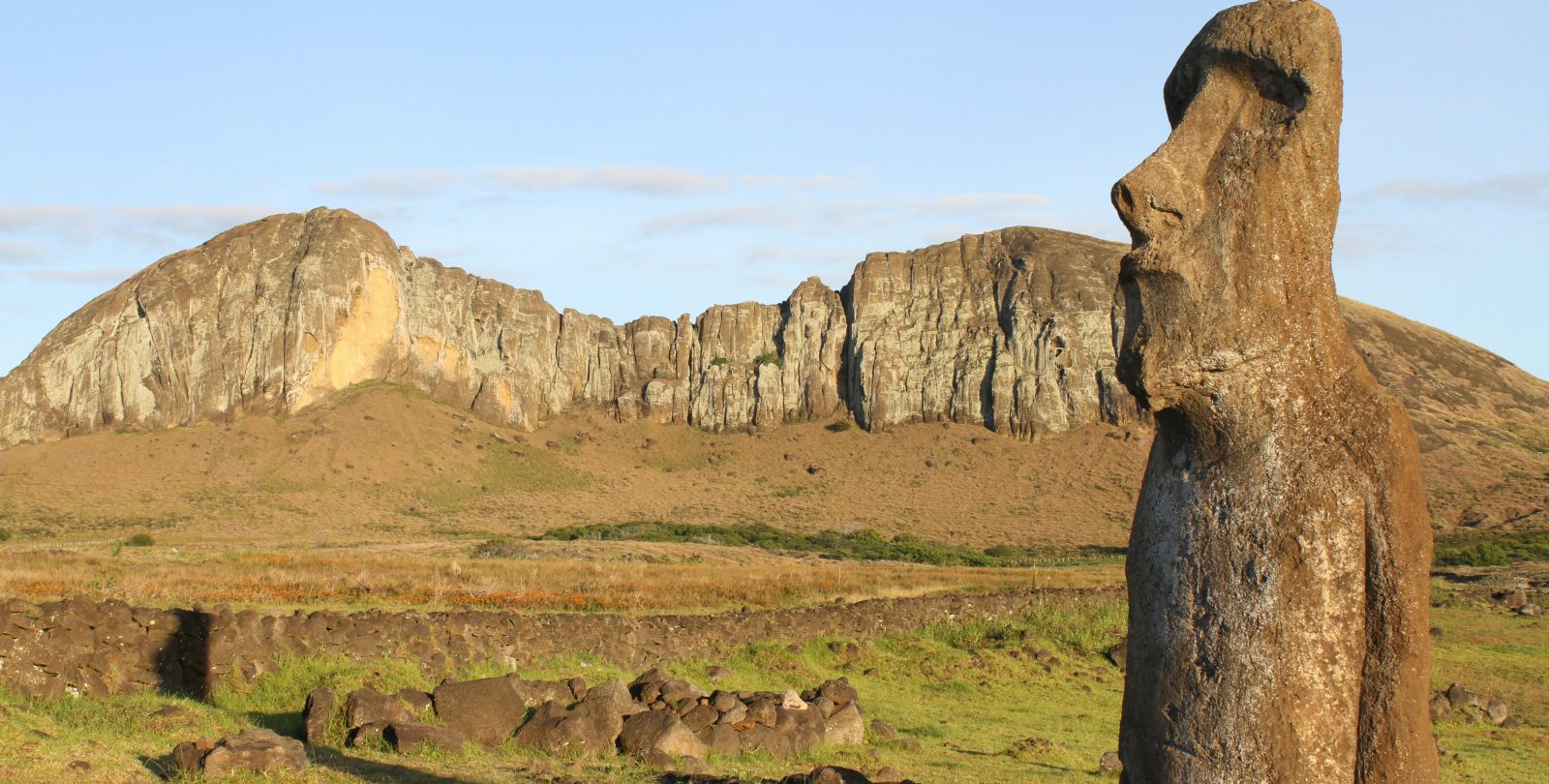 A Maoi statue infront of a ridge on Rapa Nui Island